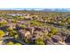 Aerial view of a community with upscale homes and mountain views at 3935 E Rough Rider Rd # 1235, Phoenix, AZ 85050