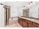 Double vanity bathroom with soaking tub and shower at 3935 E Rough Rider Rd # 1235, Phoenix, AZ 85050