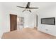 Bright bedroom with ceiling fan and carpet flooring at 3935 E Rough Rider Rd # 1235, Phoenix, AZ 85050