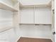 Large walk-in closet with double hanging rods and shelving at 3935 E Rough Rider Rd # 1235, Phoenix, AZ 85050