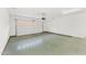 Spacious garage with ample storage cabinets and epoxy flooring at 3935 E Rough Rider Rd # 1235, Phoenix, AZ 85050