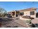 Home's backyard with hot tub and patio at 41019 N Congressional Dr, Anthem, AZ 85086