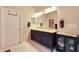 Double vanity bathroom with a large mirror and ample storage at 41019 N Congressional Dr, Anthem, AZ 85086