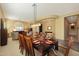 Formal dining room with a large table and seating for eight at 41019 N Congressional Dr, Anthem, AZ 85086