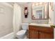 Clean bathroom with a shower/tub combo, vanity, and updated fixtures at 4140 N 81St St, Scottsdale, AZ 85251