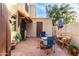 Cozy patio with seating and small table, perfect for relaxing at 4140 N 81St St, Scottsdale, AZ 85251