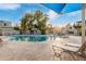 Community pool with lounge chairs for relaxing at 4140 N 81St St, Scottsdale, AZ 85251