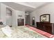 Elegant main bedroom with ensuite access and a dresser at 41925 W Arvada Ln, Maricopa, AZ 85138