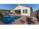 Clean rectangular pool and patio at 41925 W Arvada Ln, Maricopa, AZ 85138