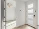 Bright entryway with modern door and view into an adjacent room at 4444 N 25Th St # 1, Phoenix, AZ 85016