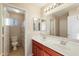 Bathroom with double vanity and a toilet at 45583 W Sheridan Rd, Maricopa, AZ 85139