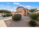 Two-story house with a well-maintained front yard and driveway at 45583 W Sheridan Rd, Maricopa, AZ 85139