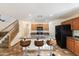 Modern kitchen with an island and stainless steel appliances at 45583 W Sheridan Rd, Maricopa, AZ 85139