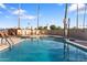 Relaxing community pool with lounge chairs at 530 S Alma School Rd # 75, Mesa, AZ 85210