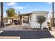 Mobile home with carport and landscaping at 530 S Alma School Rd # 75, Mesa, AZ 85210