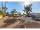 Large backyard with play structures, gazebo, and firepit at 5448 W Shaw Butte Dr, Glendale, AZ 85304