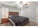 Serene bedroom with a ceiling fan and ample natural light at 5448 W Shaw Butte Dr, Glendale, AZ 85304