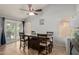 Charming dining area with a wood table and access to a patio at 5448 W Shaw Butte Dr, Glendale, AZ 85304