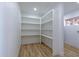 Spacious pantry with ample shelving for storage at 5725 W Osborn Rd, Phoenix, AZ 85031