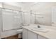 Bright bathroom featuring a shower with glass door, toilet and vanity, creating a functional space at 60 W Beechnut Pl, Chandler, AZ 85248