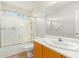 Bathroom featuring shower with glass doors, sink vanity and toilet at 60 W Beechnut Pl, Chandler, AZ 85248