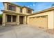 Charming two-story home with attached two-car garage and desert-style landscaping at 60 W Beechnut Pl, Chandler, AZ 85248