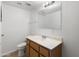 Bathroom features a vanity, toilet, and a large mirror at 6302 N 64Th Dr # 4, Glendale, AZ 85301