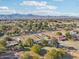 Wide aerial view of property and surrounding landscape with mountain views at 6611 N 181St Ave, Waddell, AZ 85355