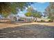 Large backyard with mature trees and plenty of space at 6611 N 181St Ave, Waddell, AZ 85355