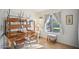 Charming dining area with rustic wooden table and leather chairs at 6611 N 181St Ave, Waddell, AZ 85355