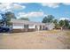 House exterior view, showcasing landscaping and driveway at 6611 N 181St Ave, Waddell, AZ 85355