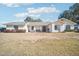 Single story home with front yard and landscaping at 6611 N 181St Ave, Waddell, AZ 85355