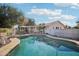 Inviting kidney shaped pool with plenty of space for relaxing at 6611 N 181St Ave, Waddell, AZ 85355