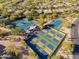 Aerial view showing tennis and pickleball courts at 6963 E Bramble Berry Ln, Scottsdale, AZ 85266