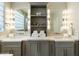 Spa-like bathroom with double vanity and quartz countertops at 6963 E Bramble Berry Ln, Scottsdale, AZ 85266