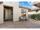 Private courtyard with seating area and desert landscaping at 6963 E Bramble Berry Ln, Scottsdale, AZ 85266