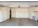 Garage with built-in storage and extra space for parking at 6963 E Bramble Berry Ln, Scottsdale, AZ 85266