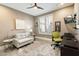 Bright home office with built-in shelving and ceiling fan at 6963 E Bramble Berry Ln, Scottsdale, AZ 85266