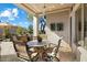 Covered patio with seating area, perfect for outdoor dining at 6963 E Bramble Berry Ln, Scottsdale, AZ 85266