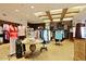 Well-lit pro shop with clothing, equipment, and accessories at 6963 E Bramble Berry Ln, Scottsdale, AZ 85266