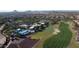 Aerial view of community amenities including pool, clubhouse, and golf course at 8088 W Cinder Brook Way, Florence, AZ 85132