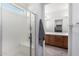 Main bathroom with large shower and double sinks at 8088 W Cinder Brook Way, Florence, AZ 85132