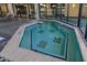 Relaxing hot tub with tiled seating at 8088 W Cinder Brook Way, Florence, AZ 85132