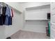 Spacious walk-in closet with ample shelving at 8088 W Cinder Brook Way, Florence, AZ 85132