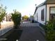 Small backyard with gravel landscaping and white picket fence at 8600 E Broadway Rd # 43, Mesa, AZ 85208