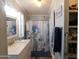 Bathroom with shower, vanity, and linen closet at 8600 E Broadway Rd # 43, Mesa, AZ 85208