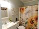 Charming bathroom with sunflower shower curtain at 8600 E Broadway Rd # 43, Mesa, AZ 85208