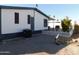 Side view of the house with a white picket fence at 8600 E Broadway Rd # 43, Mesa, AZ 85208