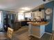 Modern kitchen features stainless steel appliances and an island at 8600 E Broadway Rd # 43, Mesa, AZ 85208