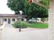 Landscaped grounds with mature trees and grassy areas at 8600 E Broadway Rd # 43, Mesa, AZ 85208